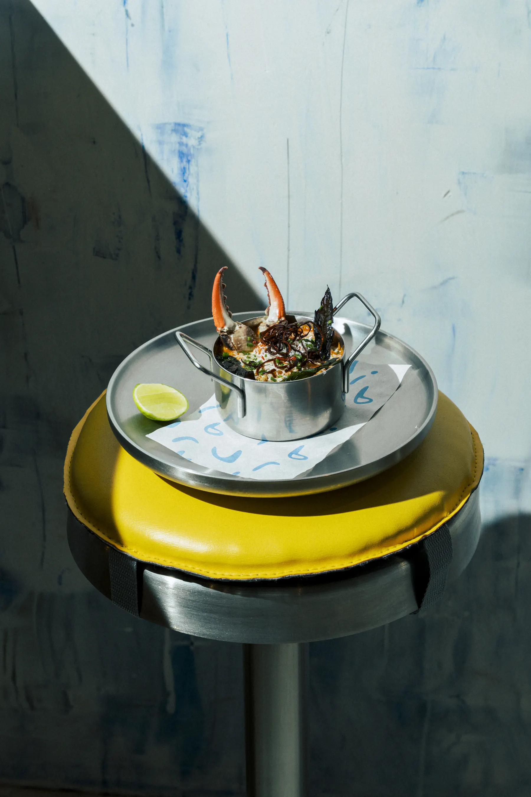 Dishes, service and the painted shark mural at El Tibur