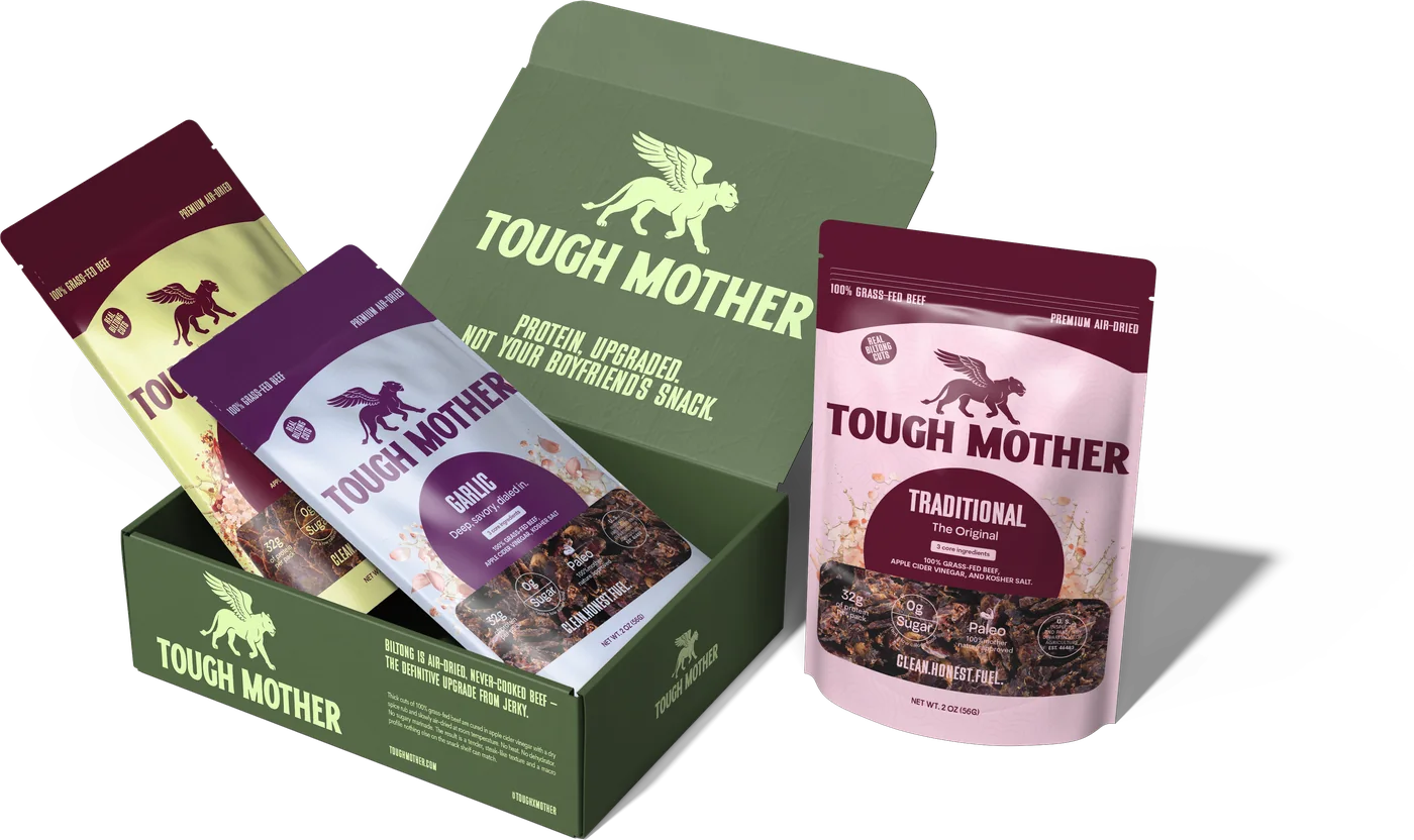 The variety three-pack: the carton open with two pouches in it and the Traditional pouch beside it
